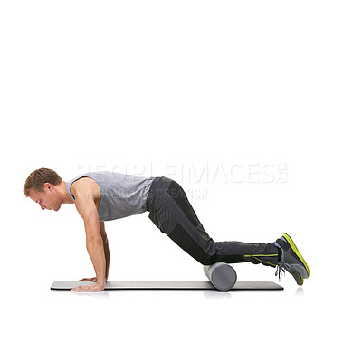 Buy stock photo Arm exercise, foam roller and man in push up for strength training, muscle endurance or pilates rehabilitation workout on ground. Yoga mat, mockup studio space or active person on white background