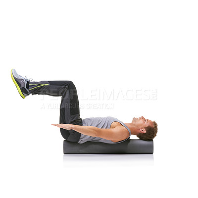 Buy stock photo Balance workout, foam roller and man in pilates back exercise, stability and endurance performance for core strength. Fitness, mockup studio space and sports athlete on white background floor