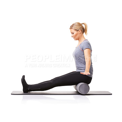 Buy stock photo Pilates, foam roller and woman in a studio for exercise, stretching or gym routine with yoga mat. Stability, balance and young female athlete from Australia with body workout by white background.