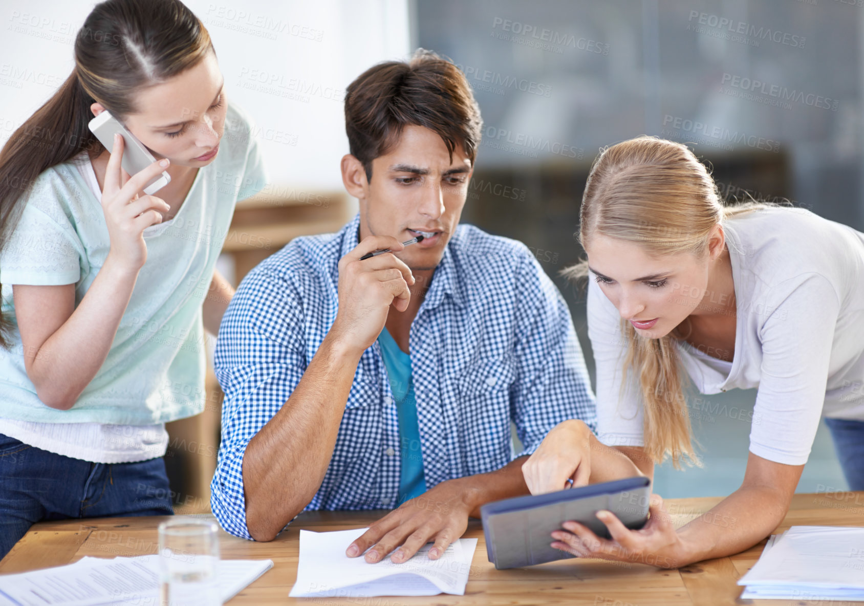 Buy stock photo Creative workshop, teamwork and people with tablet, phone call and brainstorming for research. Startup, man and women at desk at digital design office collaboration, coworking and online networking.