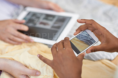 Buy stock photo Closeup cropped image of people holding a smartphone and a digital tablet