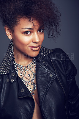 Buy stock photo Fashion, style and beauty portrait of woman in studio for trendy clothes, leather jacket or jewellery. Face of African female model with makeup, cosmetic and punk or rock aesthetic on grey background