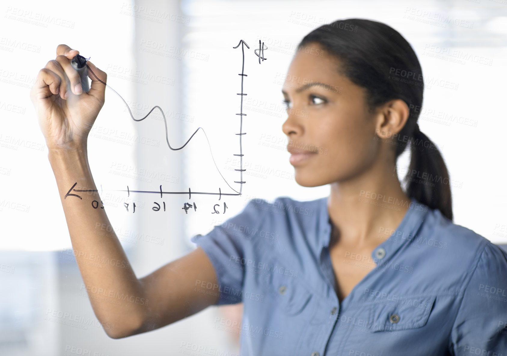 Buy stock photo A beautiful African-American woman drawing a graph on a glass wall