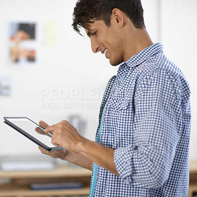 Buy stock photo Creative, business man and scroll on tablet in office for planning research, information and social network in startup agency. Happy designer review digital news, software and app with technology 