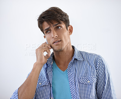 Buy stock photo Phone call, discussion and studio man listening, consulting and networking conversation with mobile cellphone user. Smartphone, communication and person speaking with contact on white background