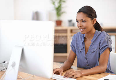 Buy stock photo Cropped shot of an attractive young businesswoman using a wireless device