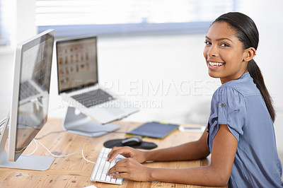 Buy stock photo Happy business woman, portrait and desktop in office for online research, website review or planning connection in creative startup. African designer, smile and typing on computer in digital agency 
