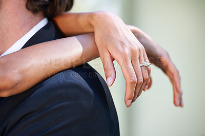 Buy stock photo Love, wedding day and hands of bride hug groom in celebration of union, commitment or event closeup. Marriage, ceremony and finger jewellery zoom on ring of woman embracing man with romance or trust