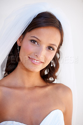 Buy stock photo Portrait, smile and a bride at her wedding for love, marriage or an event of tradition in celebration of commitment. Face, beauty and elegance with a happy young woman getting married at a ceremony