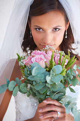 Buy stock photo Woman, portrait and flower bouquet in wedding dress for marriage commitment, love promise or diamond ring. Female person, face and plant or veil for pride romance, partnership or celebration event