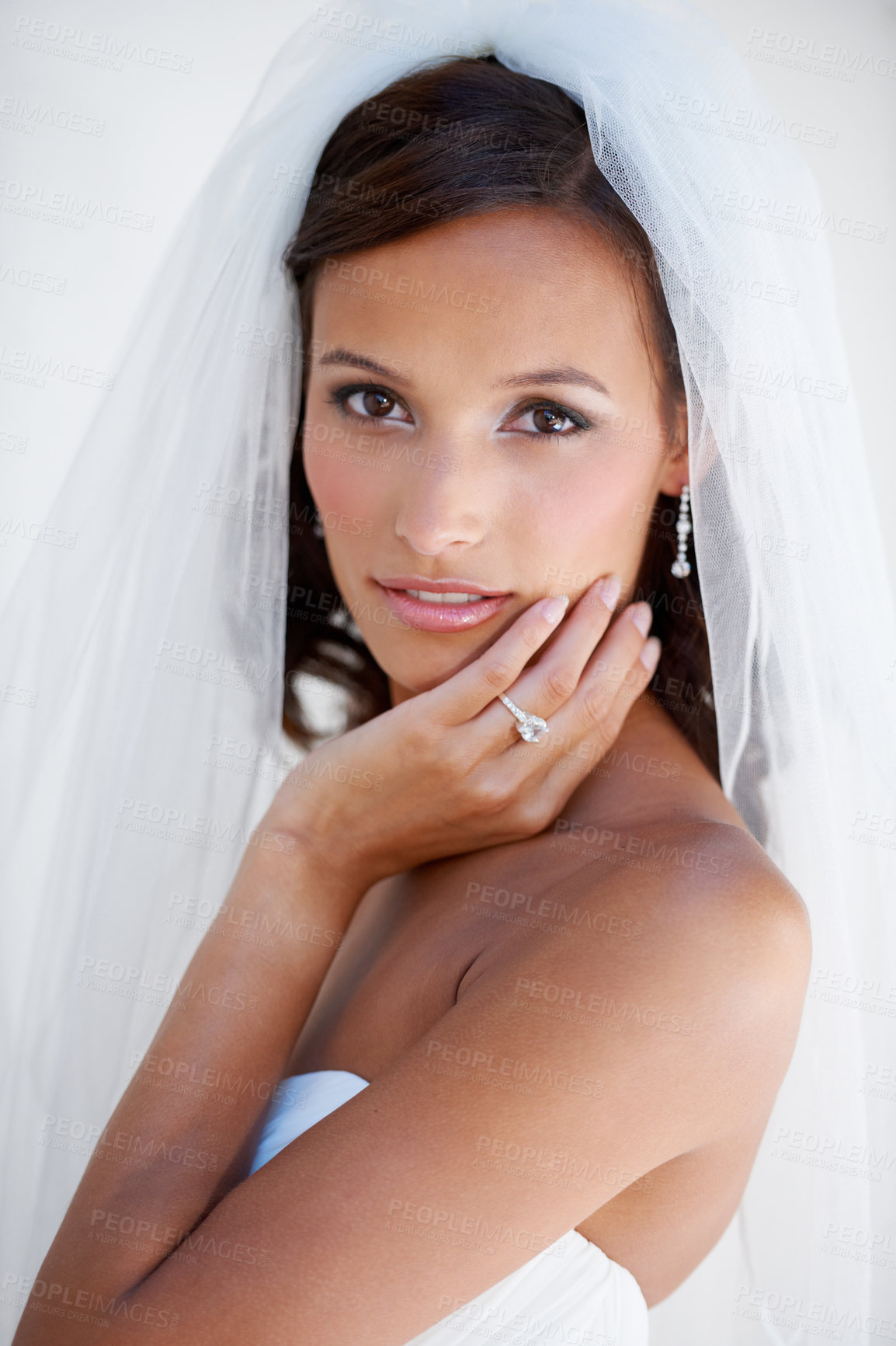 Buy stock photo A gorgeous young bride looking at the camera