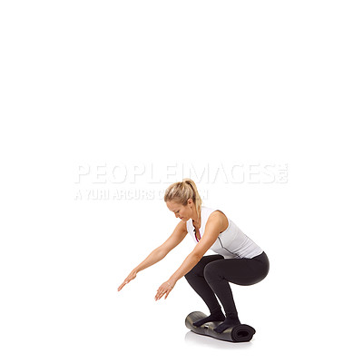 Buy stock photo Woman, squat and workout on mat, studio profile or mockup space for legs, fitness or health by white background. Girl, yoga or pilates with training, thinking and muscle development process on floor