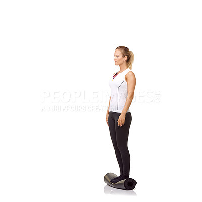 Buy stock photo Woman, balance and mat in studio for fitness, pilates or workout for healthy body, wellness or exercise. Person, face and yoga in sportswear for physical activity on mock up space or white background
