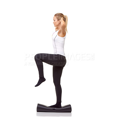 Buy stock photo Woman, balance and mat in studio for fitness, pilates or workout for healthy body, wellness or exercise. Person, face and yoga in sportswear for physical activity on mock up space or white background