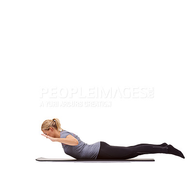 Buy stock photo Woman, back extension and yoga exercise in studio for fitness, workout and stretching body on mockup white background. Profile of healthy lady balance on mat for strong core, training and locust pose