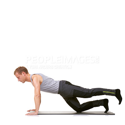 Buy stock photo Man, pilates and mat in studio for stretching legs, fitness or workout for healthy body, wellness or core muscle. Person, exercise or yoga on floor for abdomen on mockup space or white background