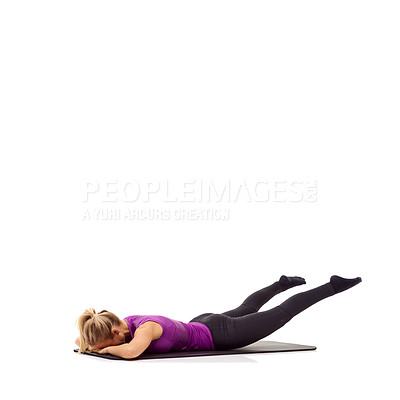 Buy stock photo Yoga, health and floor with woman in studio for stretching, exercise and wellness. Workout, fitness and self care with female person on mat of white background for pilates, body and mockup space