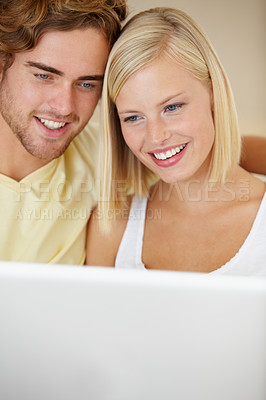 Buy stock photo Laptop, love and couple relax on a sofa with social media, movies or streaming at home together. Online shopping, search and people in a living room checking ecommerce website deal for December sale