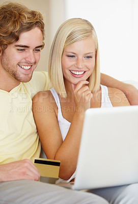 Buy stock photo Couple, credit card and thinking on computer for online shopping, loan choice or digital money on sofa at home. Happy woman and man on laptop for internet banking, website payment or e commerce ideas