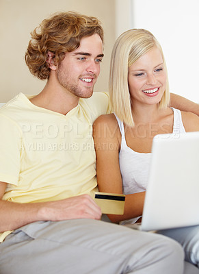 Buy stock photo Credit card, laptop and couple in a house for ecommerce, payment or investment growth check. Love, online shopping and people in a living room with budget, savings or internet search for sale or deal