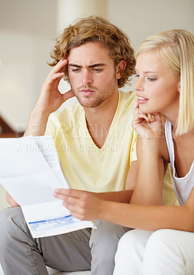 Buy stock photo Finance, paper and couple with documents in a house for future planning, investment or asset management. Paperwork, insurance and people in a living room for bills, mortgage or home loan application