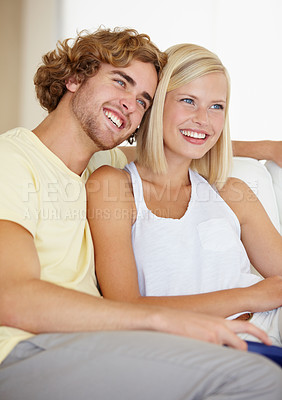 Buy stock photo Love, remote control and couple watching tv on a sofa happy with streaming, subscription or service in their home. Relax, television and people in living room with movie, video or film entertainment