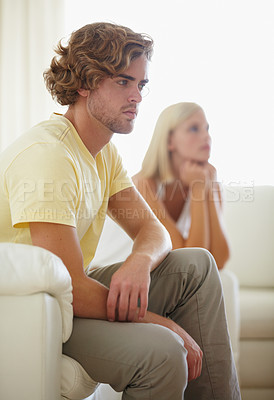 Buy stock photo Couple fight, angry and divorce stress on a sofa with argument, anxiety or cheating depression in their home. Marriage crisis, dispute and overthinking man ignore frustrated woman in a living room