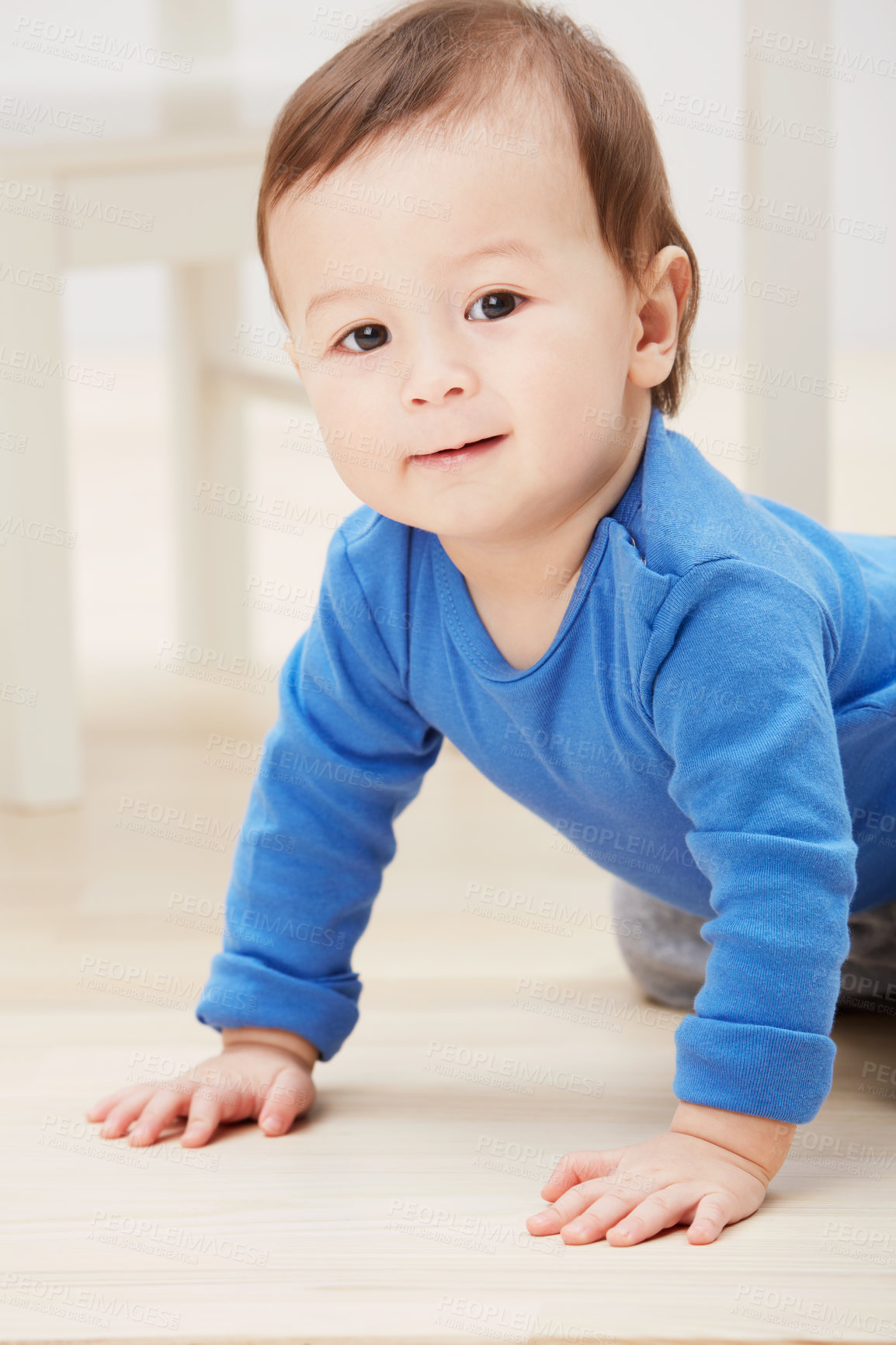 Buy stock photo Playful, crawling and portrait of baby on floor for child development, learning and youth. Young, curious and adorable with infant kid on ground of family home for growth, progress and milestone