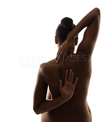 Buy stock photo Woman, nudity and naked body with back, arms and shadow for artistic, silhouette and white studio background. Model, creative and nude with skin, bare and stretching with touch, posing and beautiful