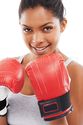 Buy stock photo A gorgeous young woman wearing boxing gloves