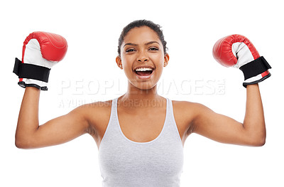 Buy stock photo A gorgeous young woman wearing boxing gloves