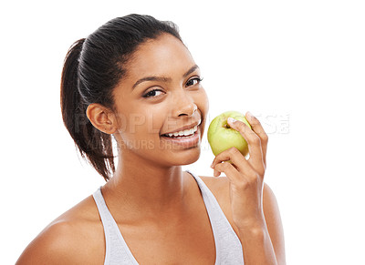 Buy stock photo Happy woman, apple and eating of healthy food for nutrition, detox and wellness in a studio portrait. Young african person with green fruit for healthcare, lunch or vegan choice on a white background