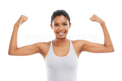 Buy stock photo A young woman in gym clothes flexing her arms