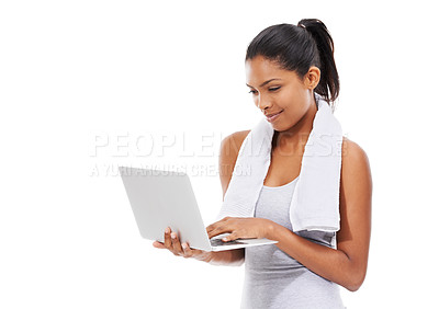 Buy stock photo Fitness, internet and woman with a laptop, typing and smile isolated on a white studio background. Person, girl and model with a computer, connection and online with information, wellness and tech
