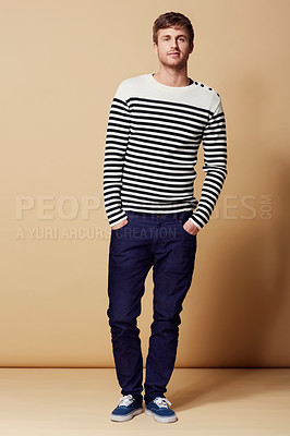 Buy stock photo Pride, fashion and portrait of man on beige background in trendy, stylish and casual clothes. Happy, attractive and person with stripe style for positive attitude, confidence and smile in studio