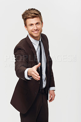 Buy stock photo Business, portrait and happy man with handshake offer in studio with welcome greeting on white background. Face, thank you or entrepreneur with shaking hands emoji for support or b2b partnership deal