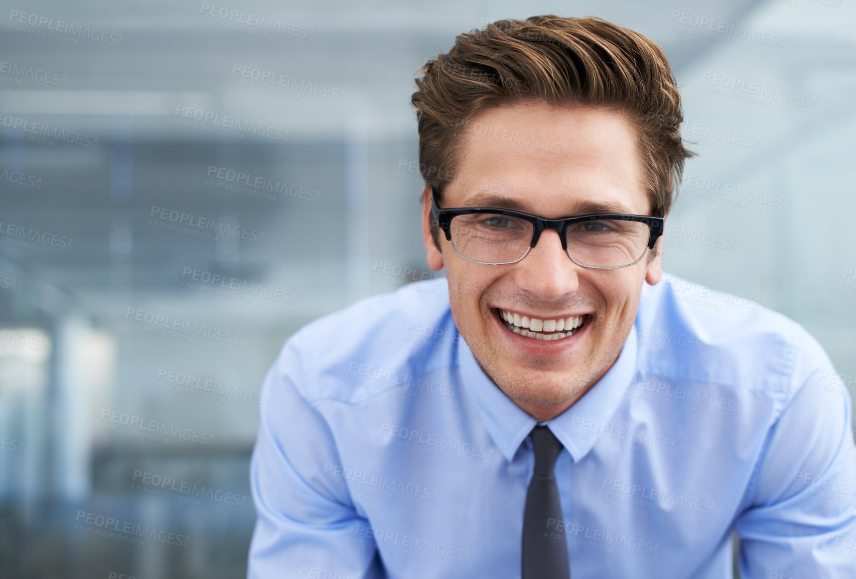 Buy stock photo A friendly young entrepreneur smiling at you alongside copyspace
