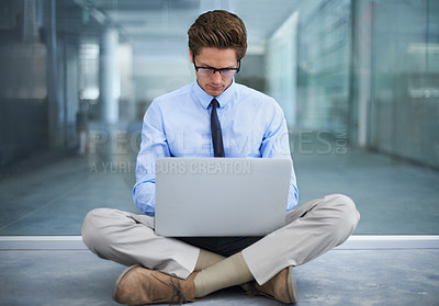 Buy stock photo Laptop, sitting on floor and business man or entrepreneur developer typing code data at remote work. Information technology, research and professional person working on computer for virtual project  
