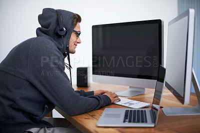 Buy stock photo Man, hoodie and hacker on computer for digital information for password error, cyber security or database glitch. Male person, dual screen and online programming for malware code, stealing or network