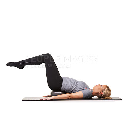 Buy stock photo Exercise legs, pilates and woman on ball in workout, training and healthy body isolated on a white studio background mockup space. Floor, mat and person on equipment for sports, balance or fitness