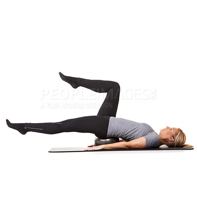 Buy stock photo Training legs, pilates and woman on ball in workout, exercise and healthy body isolated on a white studio background mockup space. Core, mat and person on equipment for sports, balance or fitness