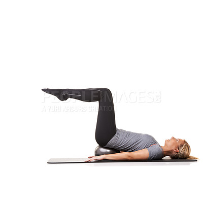 Buy stock photo Exercise legs, pilates and woman on ball in workout, training or healthy body isolated on a white studio background mockup space. Core, mat and person on equipment for balance, sports and fitness