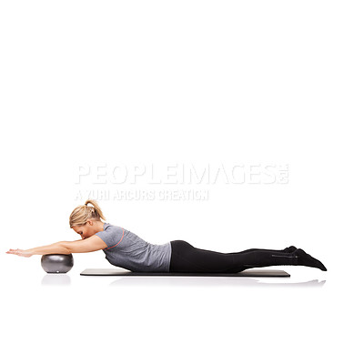 Buy stock photo Stretching, yoga exercise or woman on ball in workout, training or body health isolated on a white studio background mockup space. Flexible, mat or person on equipment for balance, pilates or fitness