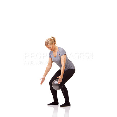 Buy stock photo Exercise knee, pilates and woman on ball in workout, training and healthy body isolated on a white studio background mockup space. Legs, balance or person on equipment for squat, fitness or wellness