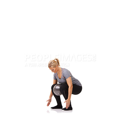 Buy stock photo Exercise knee, squat and woman on ball in workout, training and healthy body isolated on a white studio background mockup space. Legs, balance or person on equipment for  pilates, fitness or wellness