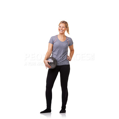 Buy stock photo A pretty young blonde holding an exercise ball after an invigorating workout