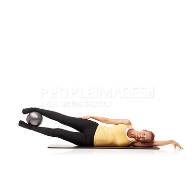 Buy stock photo Woman, portrait and ball or legs wellness for abductor squeeze exercise, strong thighs or white background. Female person, face and equipment in studio for health balance, lifting or mockup space