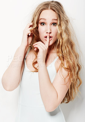 Buy stock photo Surprise, secret and portrait of woman with finger on lips with fashion white background or studio. Mystery, gossip and model with hand on mouth to whisper confidential information with privacy