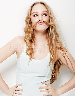 Buy stock photo Funny, woman and mustache with hair and fashion, style or confidence in white background or studio. Crazy, humor and model with formal and trendy outfit or silly pose with hairstyle for comedy