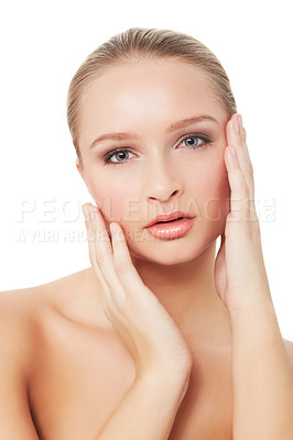 Buy stock photo A pretty young woman relishing the feel of her smooth skin